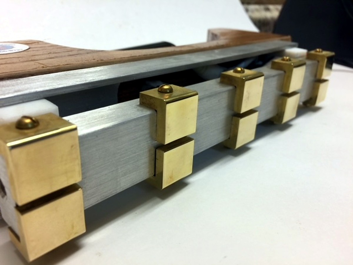 MM 10DLXPLUS stamp head: the individual brass stamp pads along the 3/16 inch brass bar