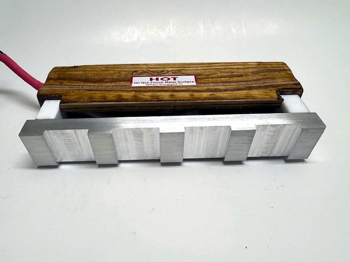 MM 10WD stamp head: the ten individual stamp pads along the bar, wood handle iron above