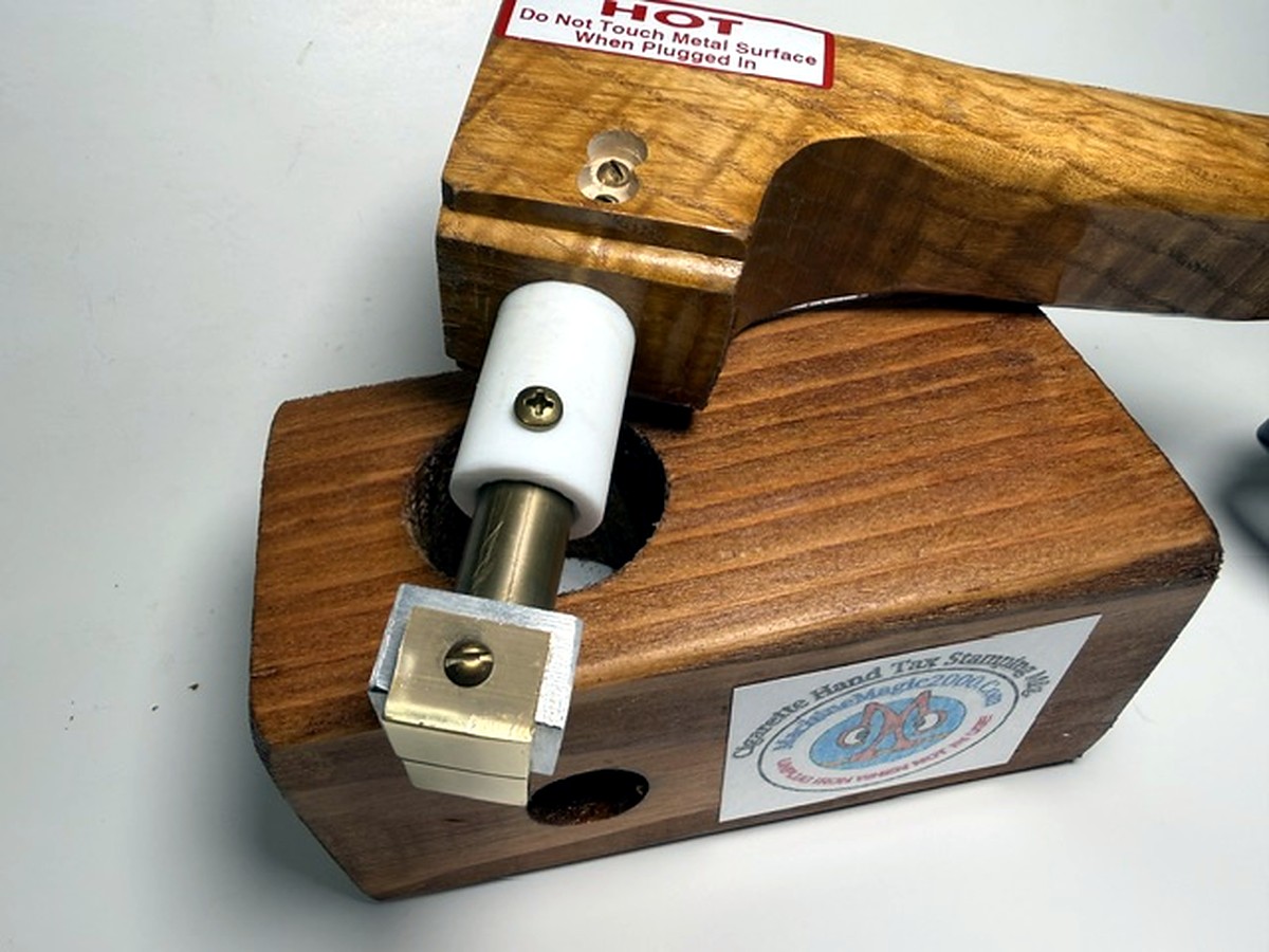 MM 4TS wood handle two stamp iron in its wooden stand with the wider brass two-stamp block